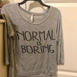 Grey “normal is boring” tee